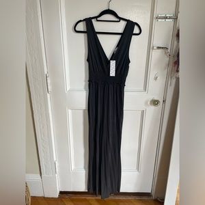 Urban Outfitters jumpsuit. Size medium. Never worn!